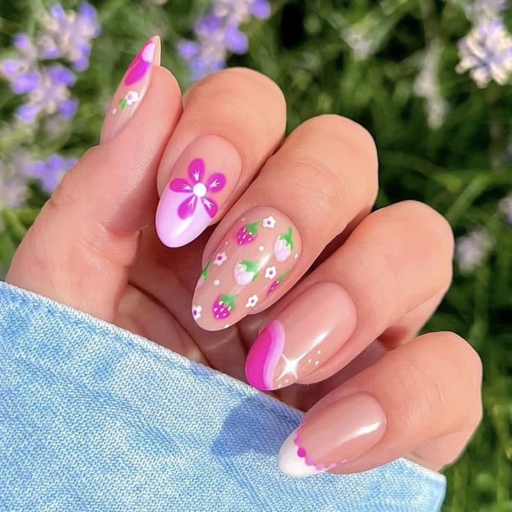 Playful Floral and Strawberry Nail Design in Soft Pastels.