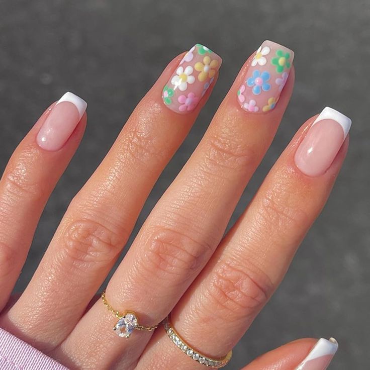 Cheerful Pastel Floral Nail Design with Classic French Tips