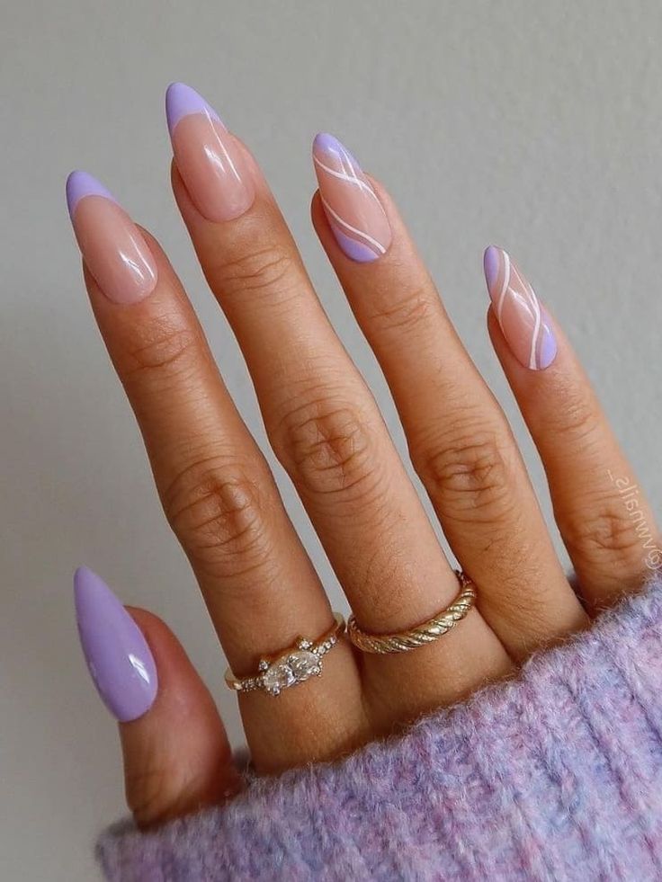 Chic Almond-Shaped Nails in Soft Lavender and Transparent Hues for a Modern Look.