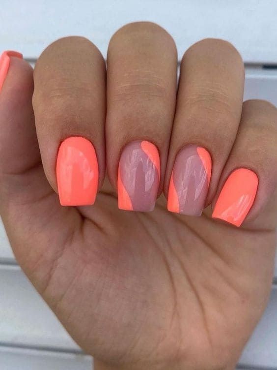 Vibrant Neon Pink and Nude Geometric Nail Design: A Striking and Stylish Manicure.