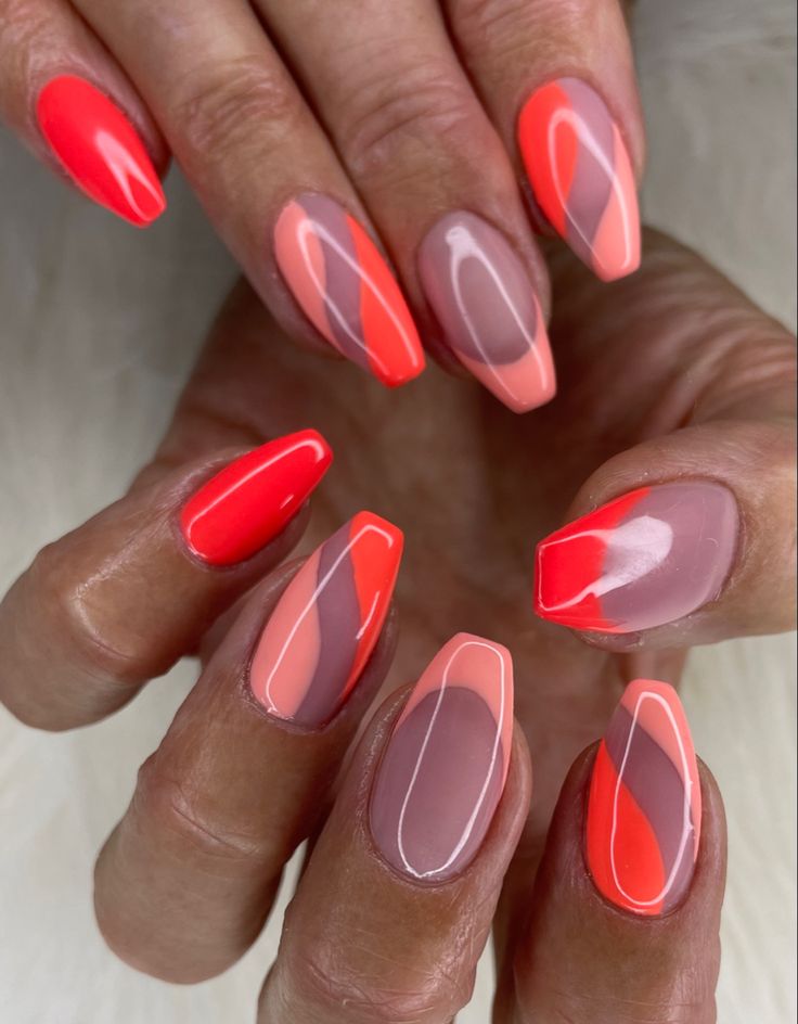 Vibrant Geometric Nail Art: A Chic Fusion of Coral and Peach Tones