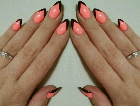 Chic Edgy Pink and Black Nail Design: A Bold Statement for Modern Flair.