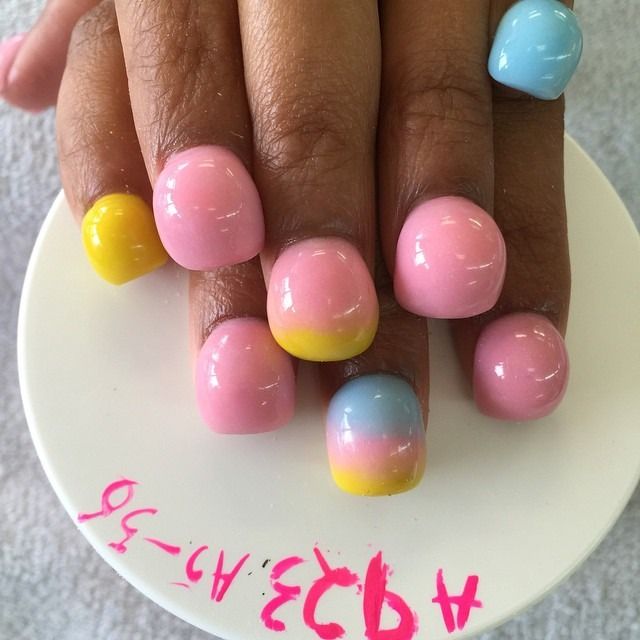 Playful Pastel Gradient Nail Design for a Cheerful Summer Look