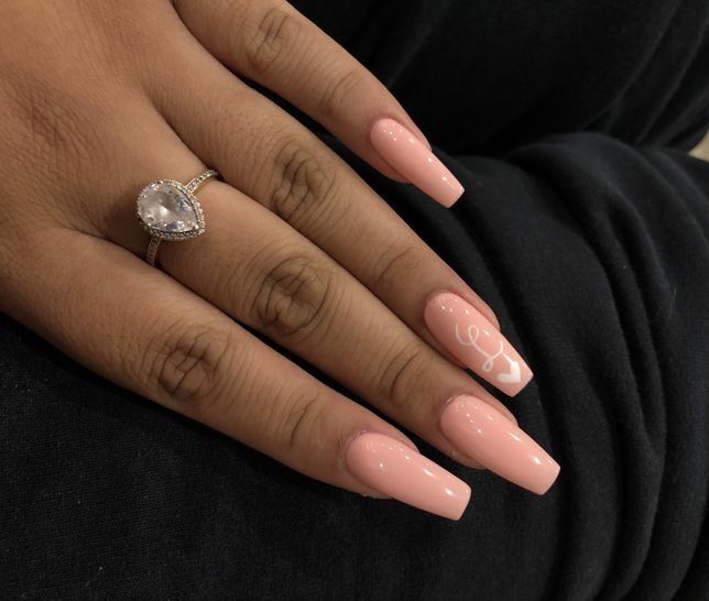 Chic Soft Pink Long Nails with Artistic Accent for Any Occasion