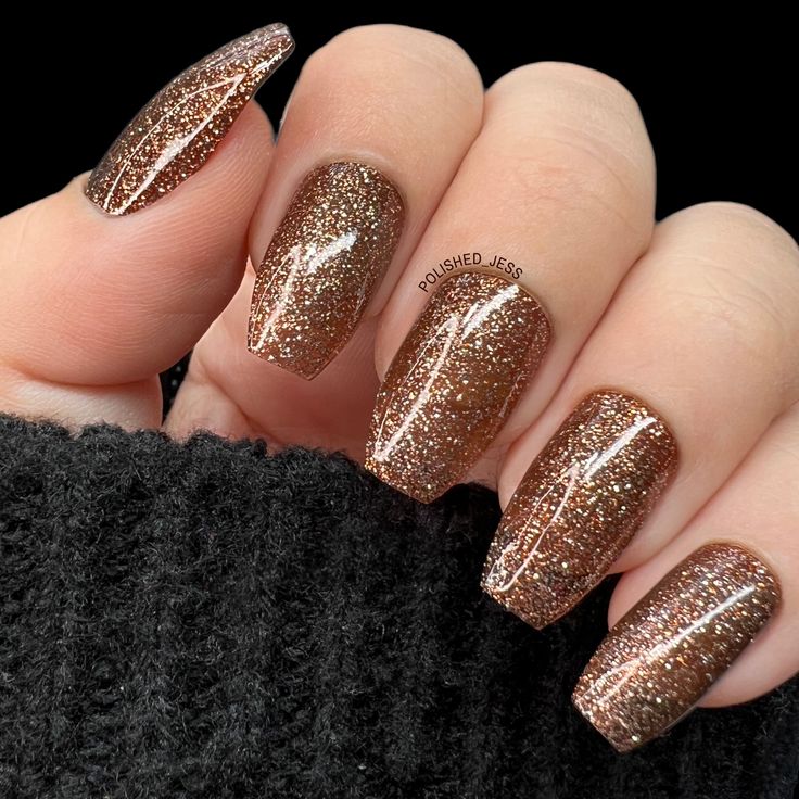 Sophisticated Glistening Brown Nails with Glitter and Golden Undertones