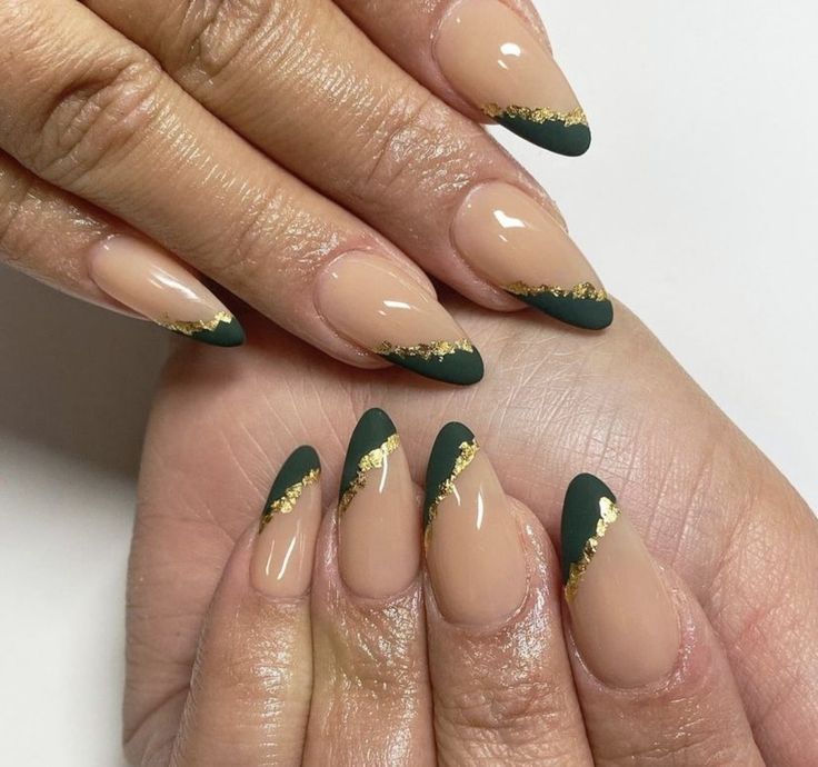 Chic Triangular Nude and Deep Green Nail Design with Luxurious Gold Accents.