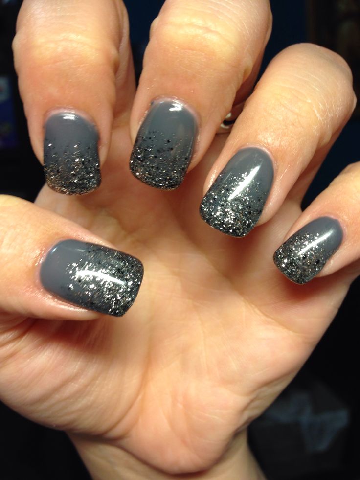 Elegant Chic Gradient Nail Design with Gray and Black Glitter Ombre Effect