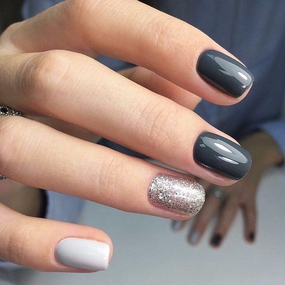 Elegant Nail Design Blending Dark and Light Grays with Sparkling Silver Accents.