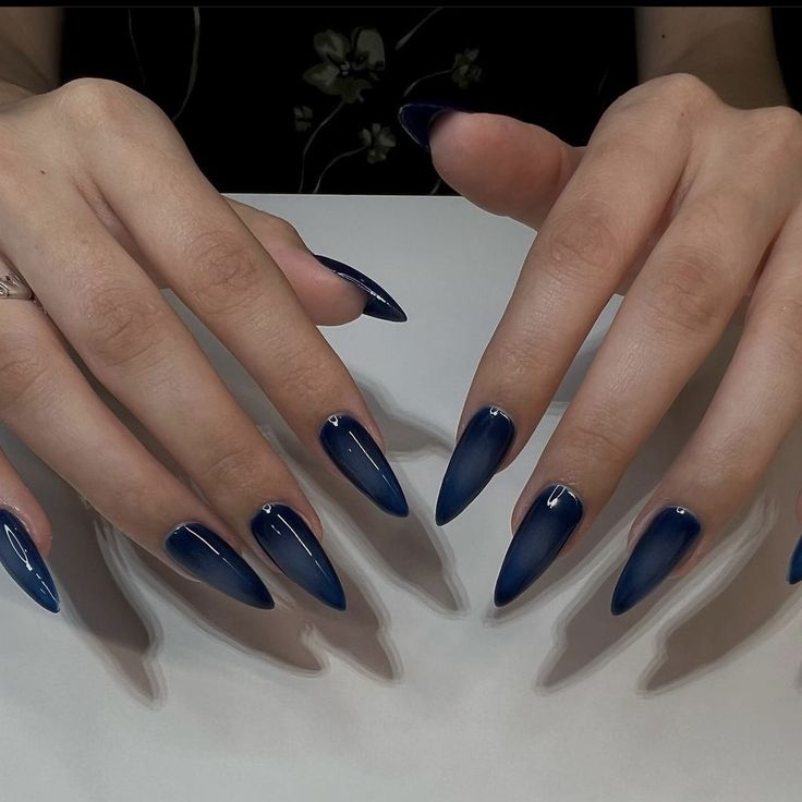 Sophisticated Navy Blue Gradient Almond Nails with Subtle Cuticle Art