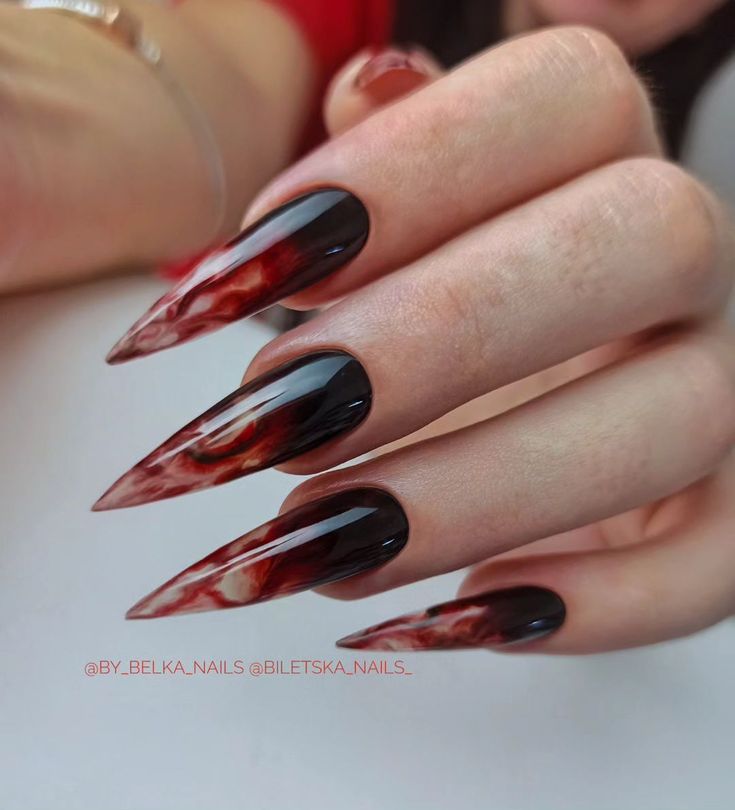 Stunning Fiery Ombre Stiletto Nails: Bold Black to Vivid Red Gradient for a Dramatic Statement.