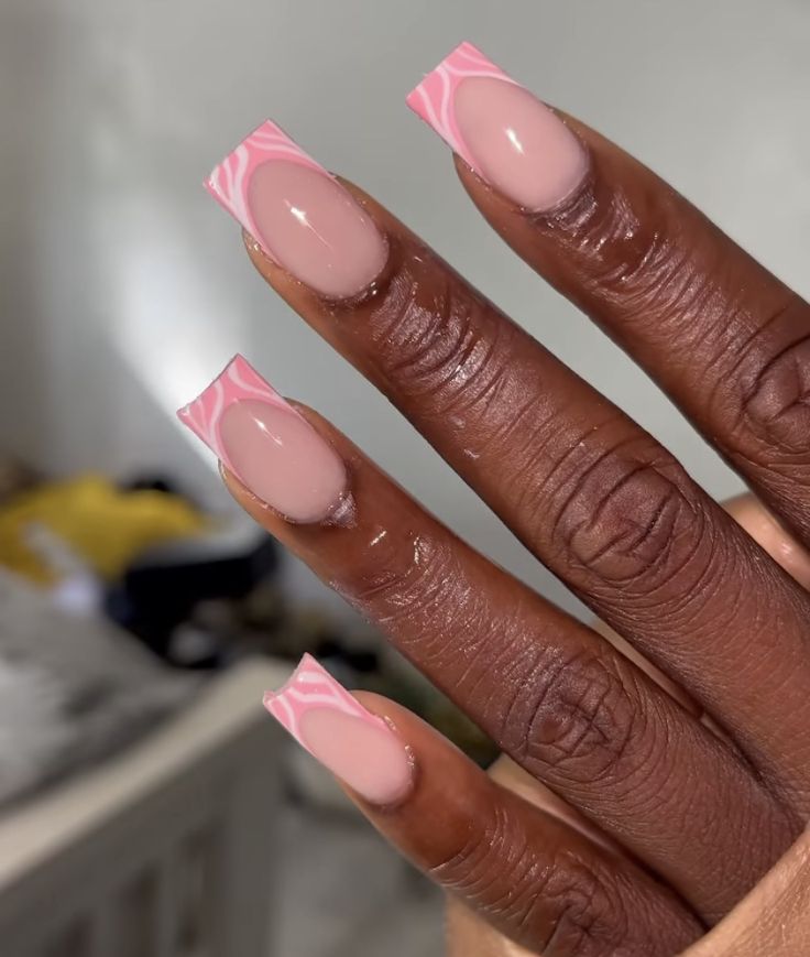 Elegant Playful Manicure: Modern Pink Design with Swirling Tips