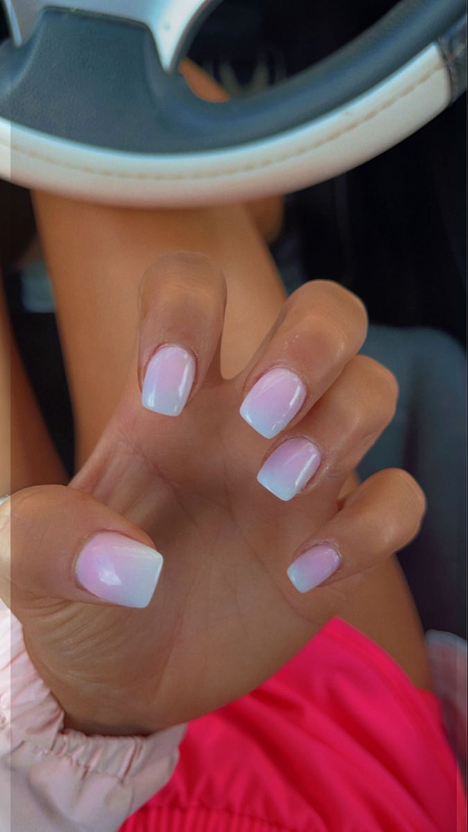 Sophisticated Ombre Nail Design: Sheer Pink to Crisp White with Modern Square Shape.