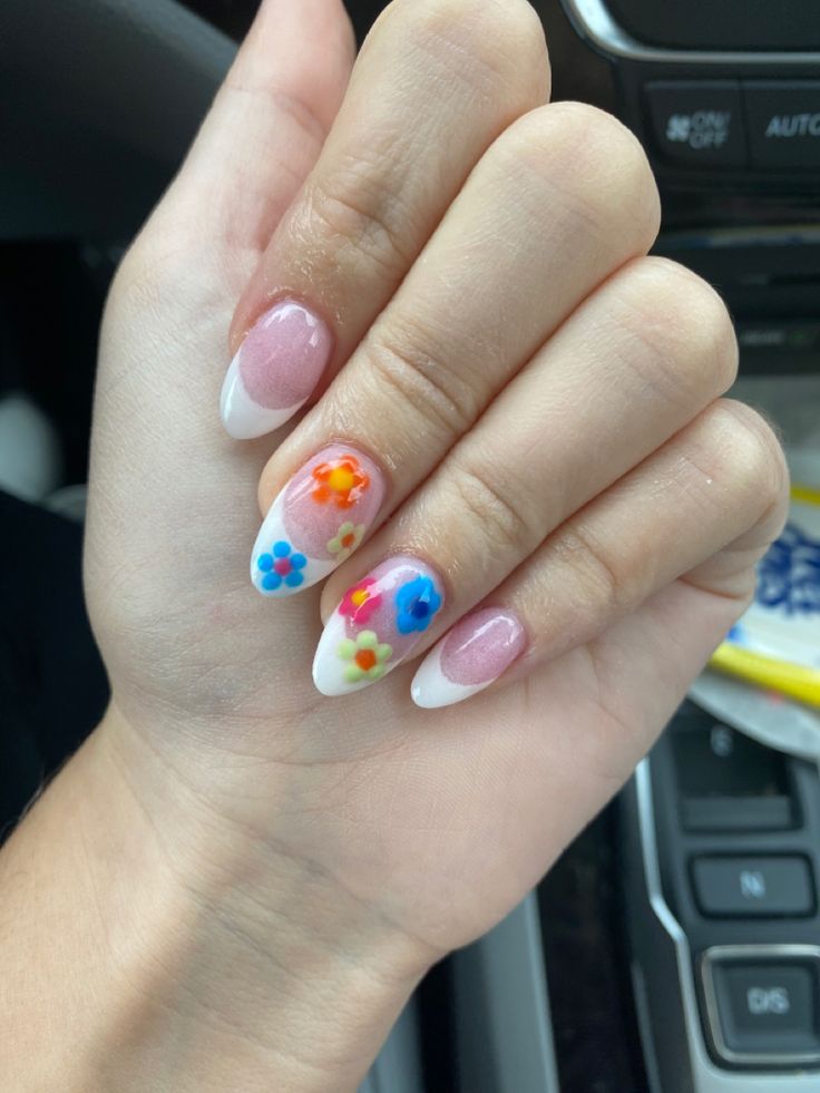 Vibrant Pastel Floral Nail Design with Elegant White Tips for Casual Chic.