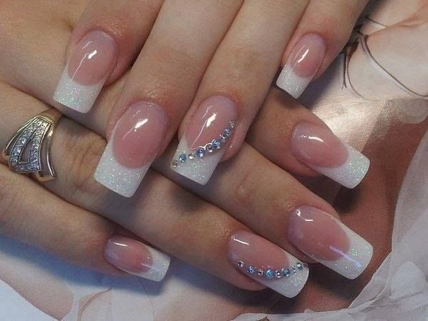 Elegant Modern French Manicure with Subtle Pink Gradient and Gem Accents.