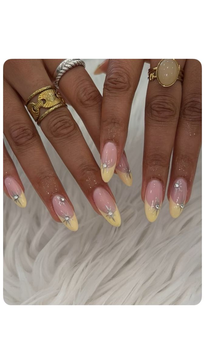 Chic Soft Pink and Vibrant Yellow Nail Design with Silver Embellishments