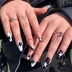 Chic Black and White Star-Themed Nail Design with Glossy Finish