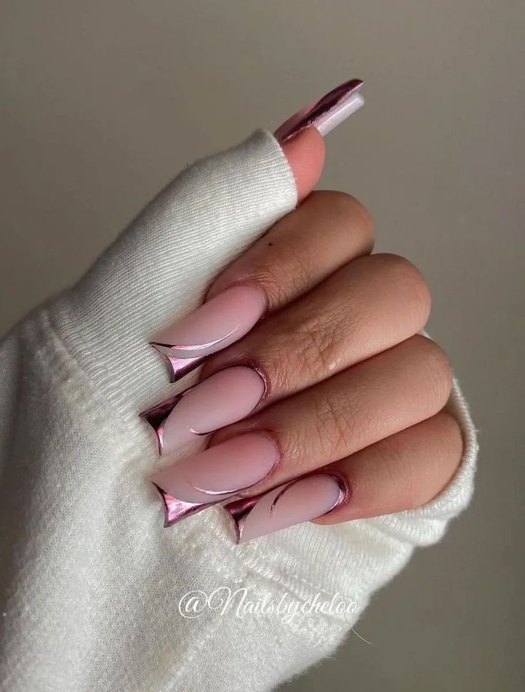 Chic Ombre Nail Design with Metallic Rose Gold Accents on Almond-Shaped Nails