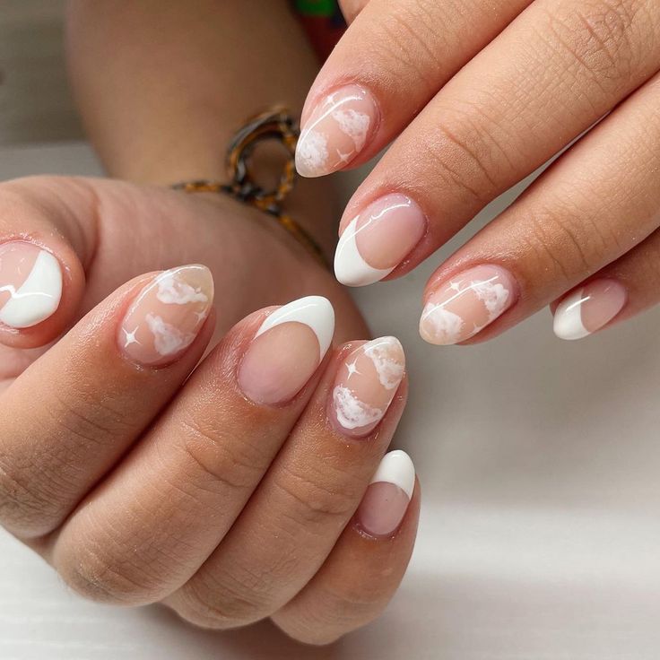 Sophisticated French Tips with Artistic Marbled Accents for Elegant Nail Design.