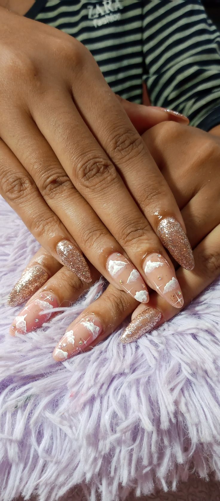 Chic and Playful Pastel Nails with Glitter and Gold Accents.