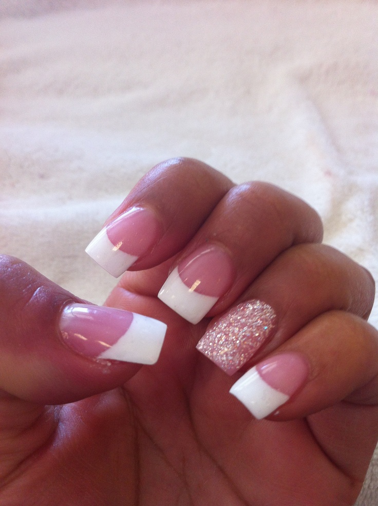 Sophisticated French Tip Nail Design with Glitter Accents for Any Occasion.