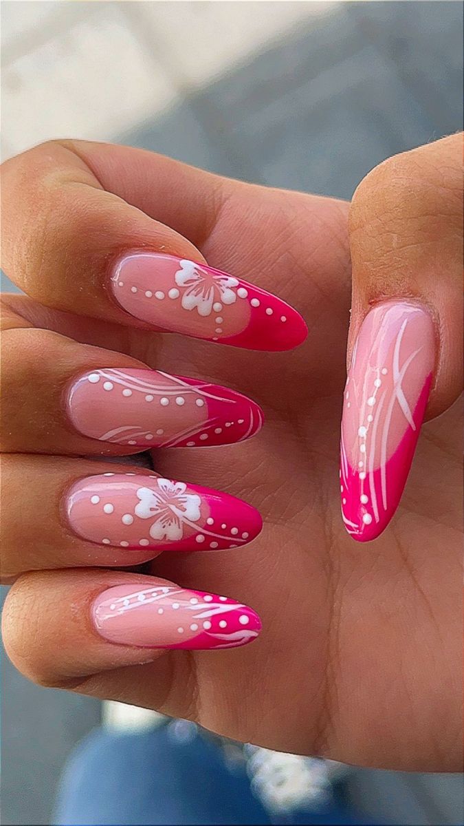 Elegant Floral Pink Gradient Nail Design with Intricate Patterns.