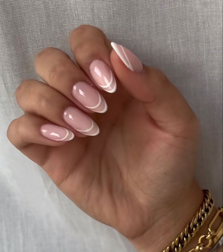 Sophisticated Almond-Shaped Pink and White French Manicure Design