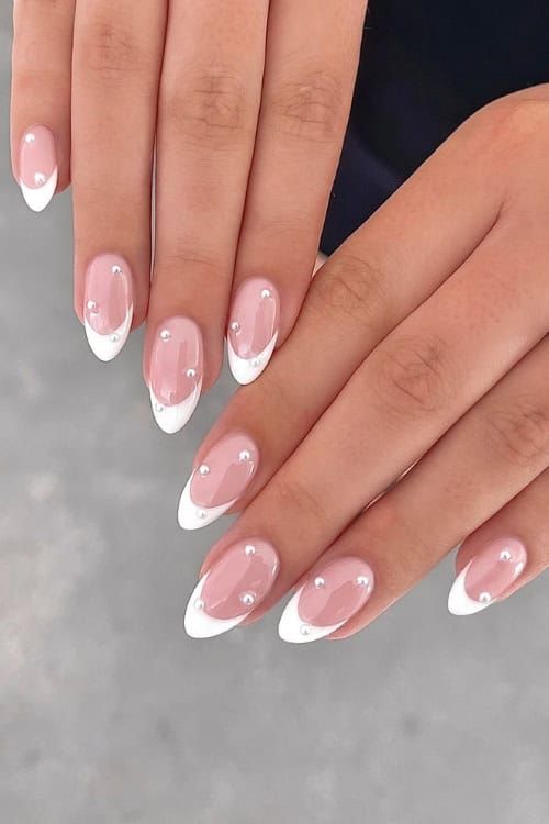 Chic French Tip Nail Design with Rhinestones: A Glamorous Twist on Elegance