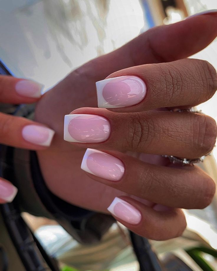 Chic Soft Pink French Tip Nail Design: A Timelessly Elegant Choice for Any Occasion.