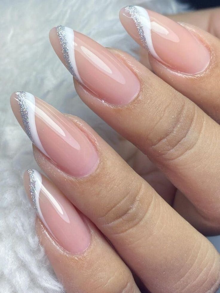 Chic Elegant Nail Design: Glossy Nude Base with White and Silver Tips