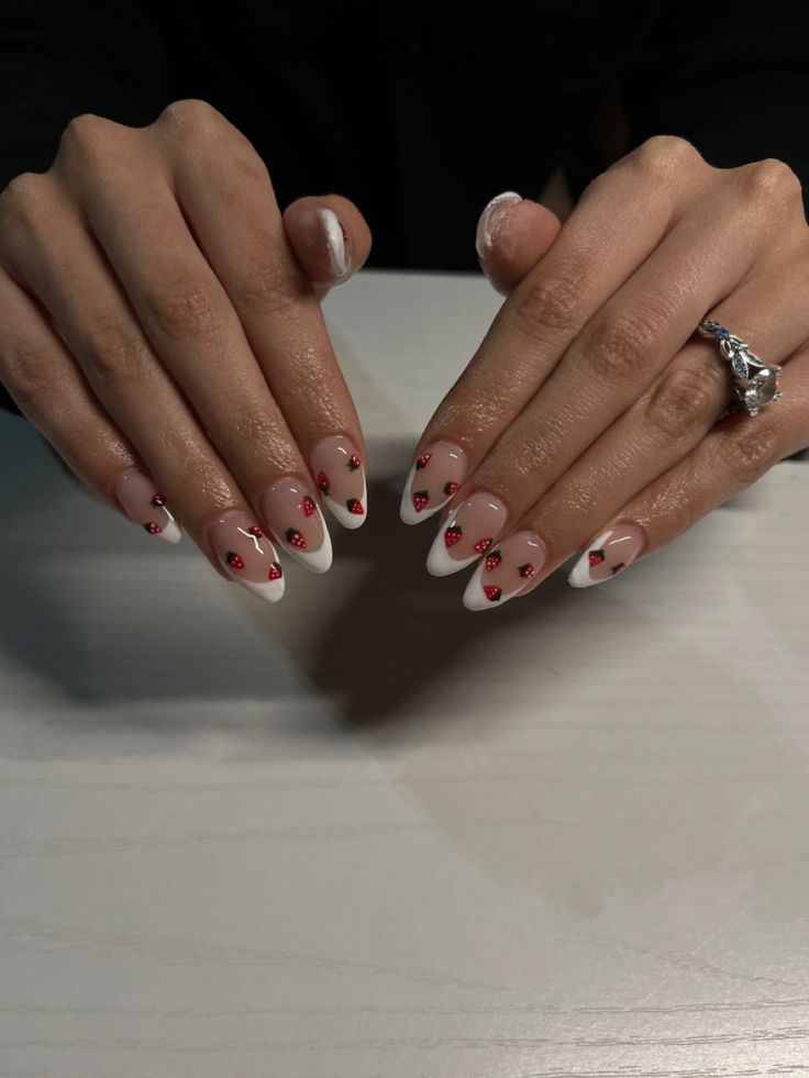 Chic Almond-Shaped Nails: Nude Base with Classic French Tips and Playful Red Heart Accents