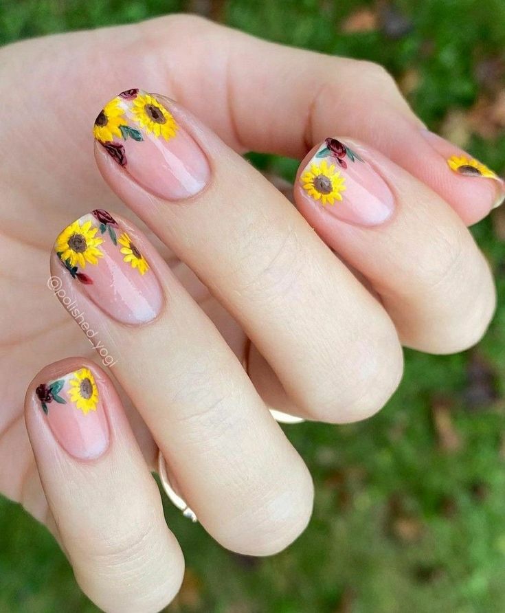 Vibrant Floral Nail Design with Sunflowers and Red Accents for a Cheerful Summer Look.