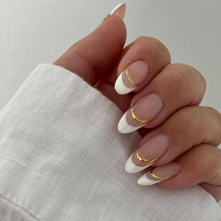 Sophisticated French Tip Manicure with Elegant Gold Detail