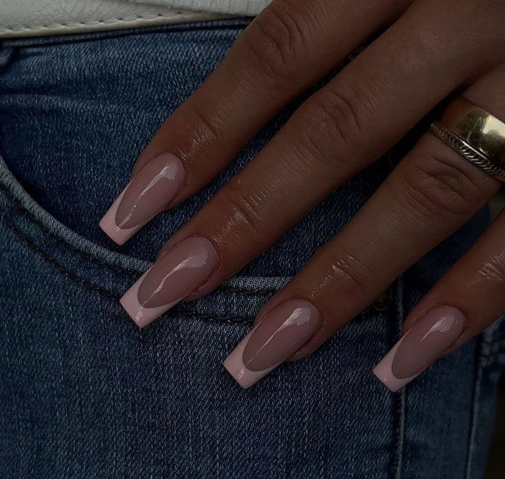 Chic Nude and Soft Pink Nail Design with Squared Tips and Glossy Finish.