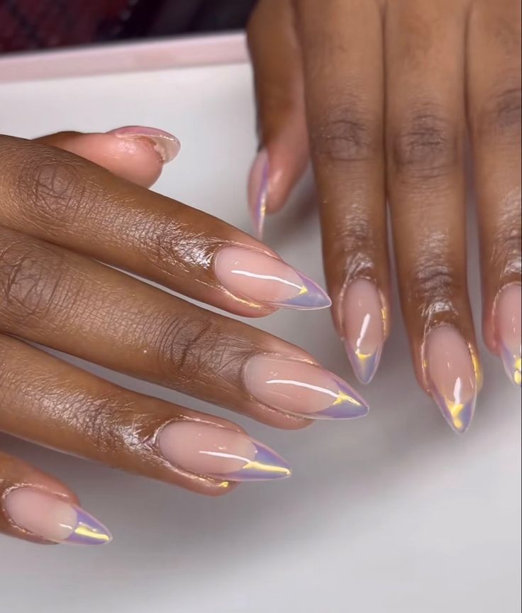 Chic Nude and Purple Gradient Almond Nail Design with Glossy Finish