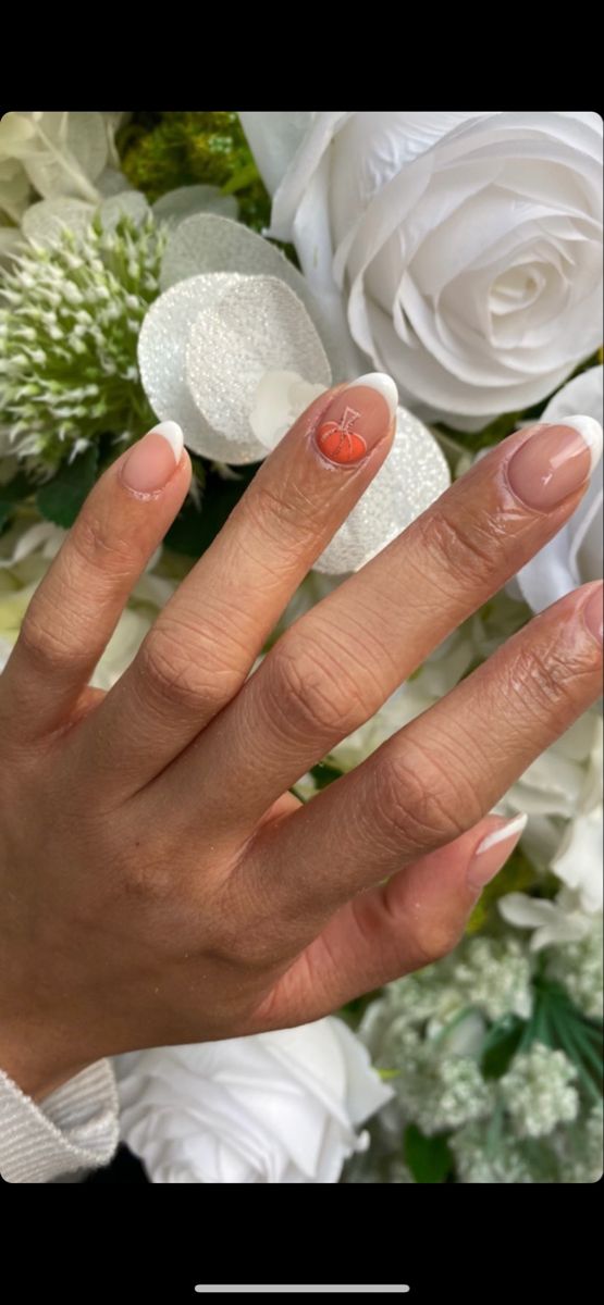 Elegant Nude and White Nail Design with Playful Cherry Motif