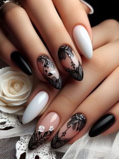 Sophisticated Nail Design: Elegant Black, White, and Nude Shades with Lace and Floral Accents