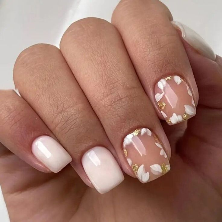 Sophisticated Elegant Nail Design with Pale Pink Gradient and White Floral Accents