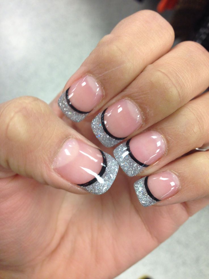 Chic Soft Pink and Shimmering Silver Nail Design with Contemporary Black Accents.