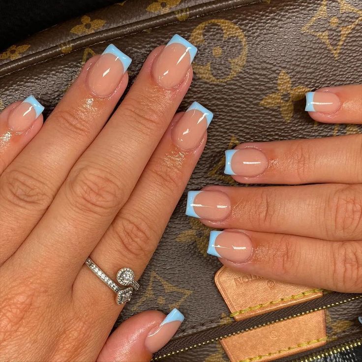 Chic Baby Blue French Tip Nail Design for Sophisticated Elegance.