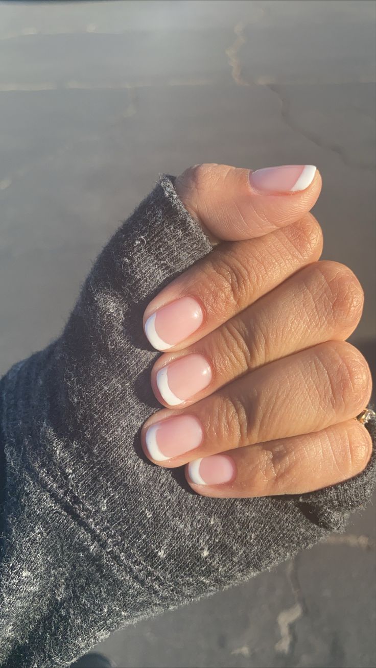 Timeless Elegant French Tip Nail Design: Soft Pink Base with Crisp White Edges