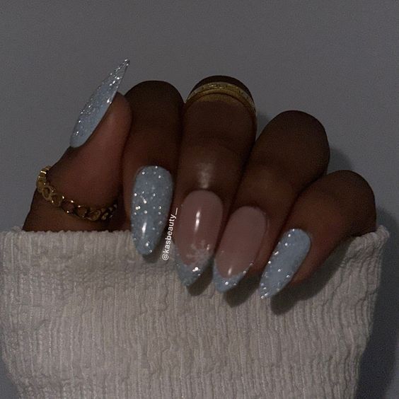 Chic Pastel Almond Nail Design with Glitter Tips for Any Occasion.