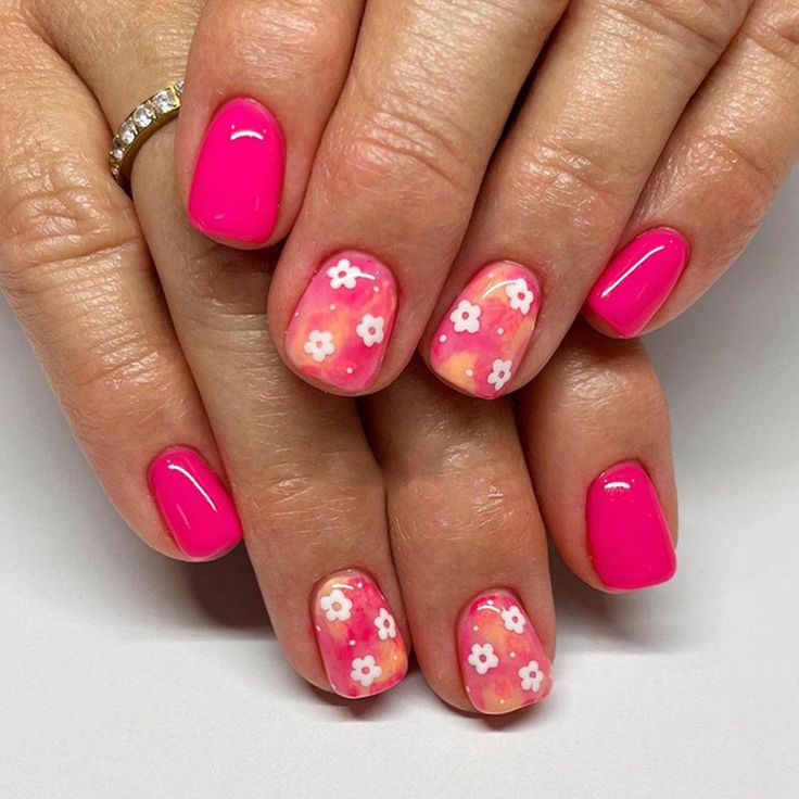 Cheerful Floral Pink Nail Design for Spring and Summer.