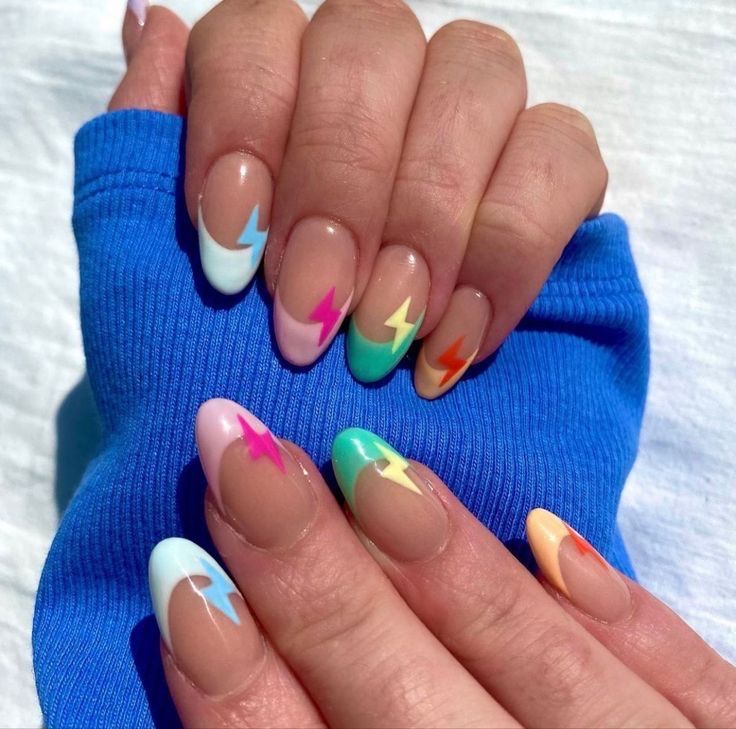 Vibrant Pastel Lightning Bolt Nail Design: A Playful Mix of Colors