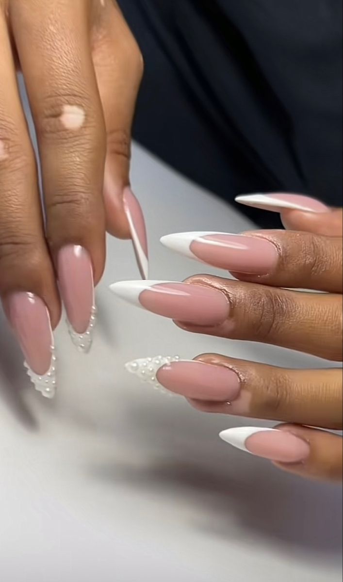 Chic Nail Design: Soft Pink with Sharp White Accents and Pearl Details