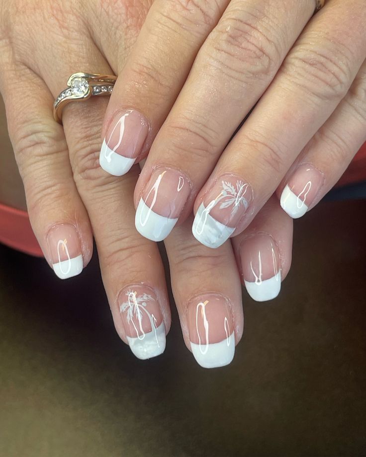 Chic French Tip Nail Design with Tropical Palm Tree Accents