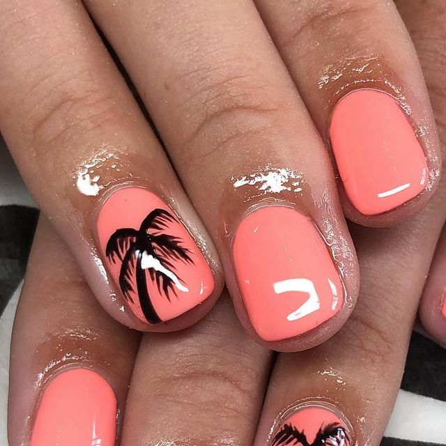 Tropical-Inspired Nail Design: Vibrant Coral with Elegant Black Palm Tree Accents for a Beach Getaway Vibe.