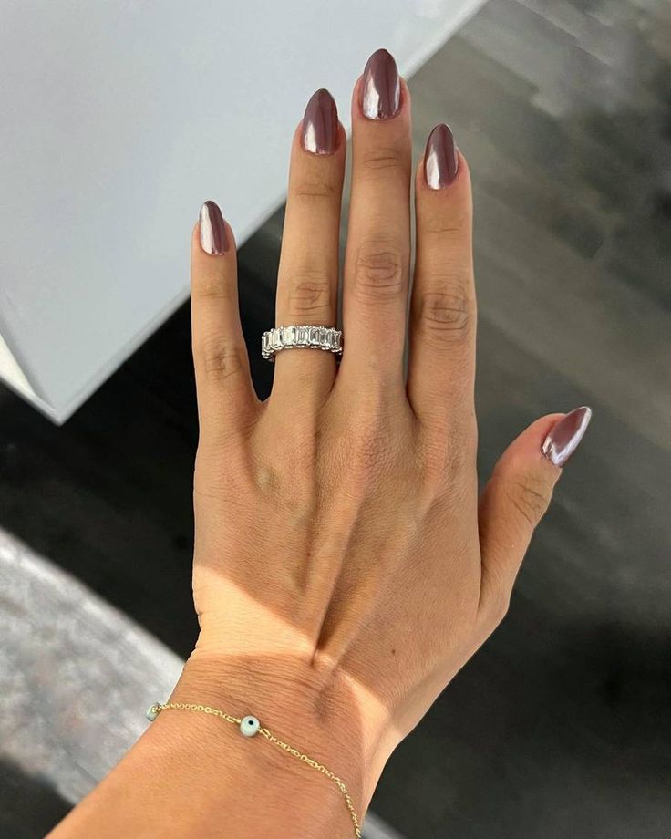 Stunning Metallic Mauve Almond-Shaped Nails: A Touch of Glamour for Any Occasion.