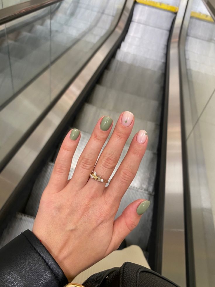 Chic Muted Green and Nude Manicure: Versatile Elegance for Any Occasion.