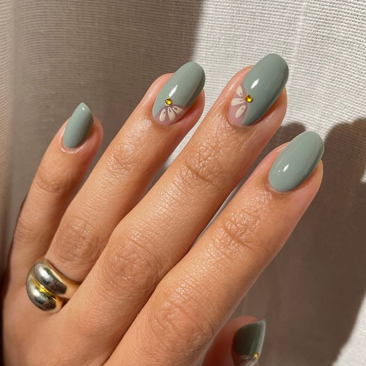 Chic Green Nail Design with Matte-Gloss Finish and Elegant Floral Accents