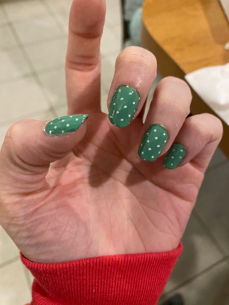 Charming Green Polka Dot Nail Design: A Playful Elegance for Any Occasion.